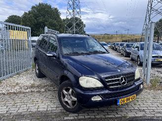 Vaurioauto  passenger cars Mercedes M-klasse grijs kenteken! 2003/9