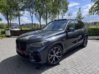 Damaged car BMW X5 BMW X5 xDrive 45e MSport PANO Sport Stoelen Trekhaak Laser light 360view VOL 2022/1