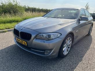 Damaged car BMW 5-serie 523i Executive Schuifdak 2010/6
