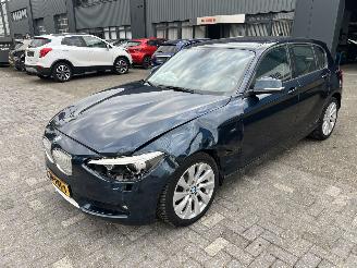 skadebil auto BMW 1-serie 116i Business+ 2012/4