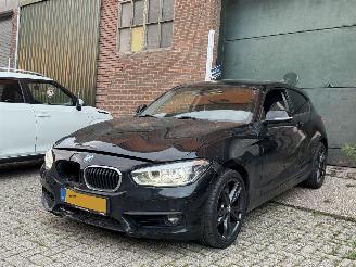 skadebil auto BMW 1-serie 118i Executive automaat KM NAP 2018/2