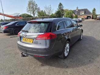 Damaged car Opel Insignia SPORTS TOURER 2.0 CDTi 2010/9