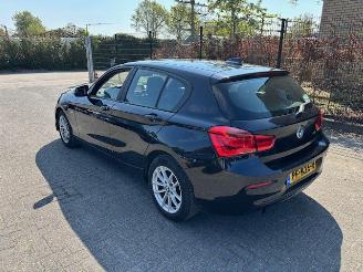 damaged passenger cars BMW 1-serie 118i Executive automaat Nap 2017/6