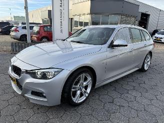 Schadeauto BMW 3-serie Touring M Sport 2019/6