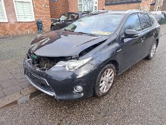 Schadeauto Toyota Auris Touring Sports 1.8 hybrid 2014/10