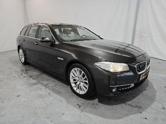 Damaged car BMW 5-serie 518d Luxury Edition 2014/2