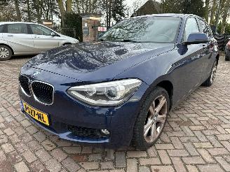 Vaurioauto  passenger cars BMW 1-serie 114d High Executive 2013/5
