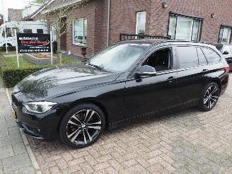 damaged passenger cars BMW 3-serie 320i Coprate Lease Executive Automaat 2018/2
