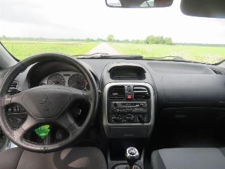 Mitsubishi Carisma 1.6 Platium 190.000km nap 5drs  2004 Airco  [schadevrij top top staat nieuwe apk picture 11