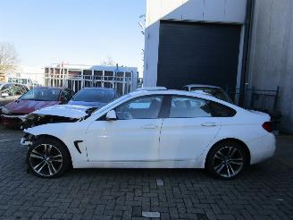 uszkodzony samochody osobowe BMW 4-serie 418i Gran Coupe Sport Line Automaat 2019/1