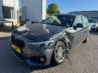 skadebil auto BMW 1-serie 120i Executive 2018/10