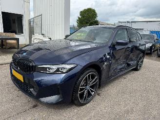 Damaged car BMW 3-serie Touring 320e AUTOMAAT 2023/5
