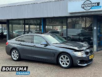 damaged passenger cars BMW 4-serie 420i Grand Coupe Open dak Navi Clima Cruise 2015/9