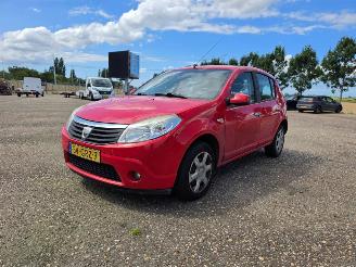 krockskadad bil auto Dacia Sandero 1.4 Lauréate Airco 2008/8