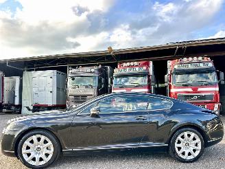 Vaurioauto  passenger cars Bentley Continental GT Coupé 6.0 W12 TwinTurbo 560pk aut - 124dkm - xenon - luchtvering - leer - massage l+r - clima - cruise - youngtimer 2005/2