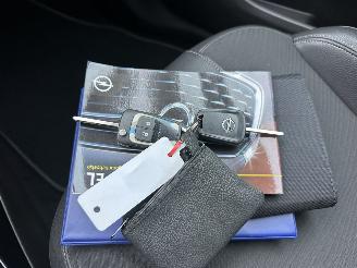 Opel Adam Cabrio 1.0 turbo 90pk 6-bak Rocks Online Ed - nap - clima - cruise - pdc v+a - 17 inch - side assist - elektr dak picture 23