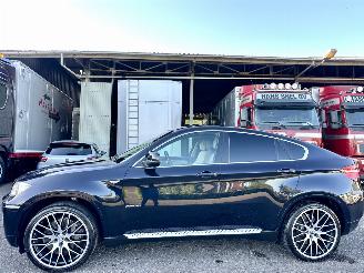 damaged passenger cars BMW X6 xDrive50i 4.4 TwinTurbo 408pk 8-traps aut + f1 Exe - facelift - hud - 22 inch - softclose - stuurverw - keyless 2009/6