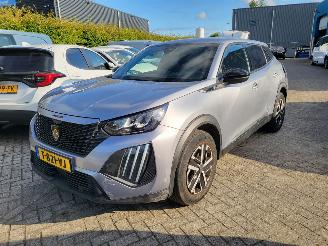 krockskadad bil auto Peugeot e-2008 e-2008 EV Active 54 kWh Range 406 km rijdbaar nwpr €43000 2023/9