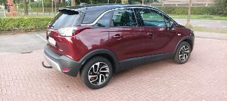 Opel Crossland Innovation uitvoering 1.2 DI Turbo OPF Automaat Navigatie AppleCarPlay Climatecontrol CruiseControl Opel iLink Winterpakket Stoelverwarming stuurwielverwarming Voorruitverwarming Dimmende binnenspiegel Chrome-pakket Parkeersensoren Trekhaak Bi-Color Lak picture 3