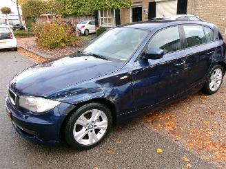 Damaged car BMW 1-serie 116 I HIGH EXECUTIVE CLIMA 2011/2