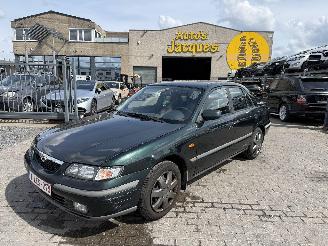 Damaged car Mazda 626 DOHC 1.9 - VALVE 2001/1