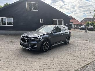 uszkodzony samochody osobowe BMW X1 HYBRIDE AUTOMAAT PANORAMADAK LEER NAVI CLIMA B.J 2020 2023/4