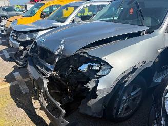 uszkodzony samochody osobowe BMW X5 3.0d xdrive 2010/1
