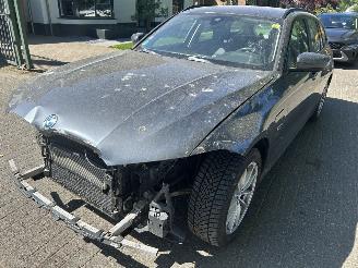 skadebil auto BMW 3-serie 320e Touring xDrive Business Automaat 2021/11
